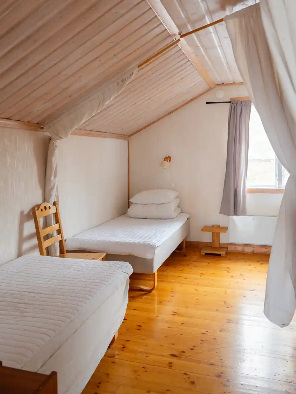 Upstairs bedroom with seven single beds