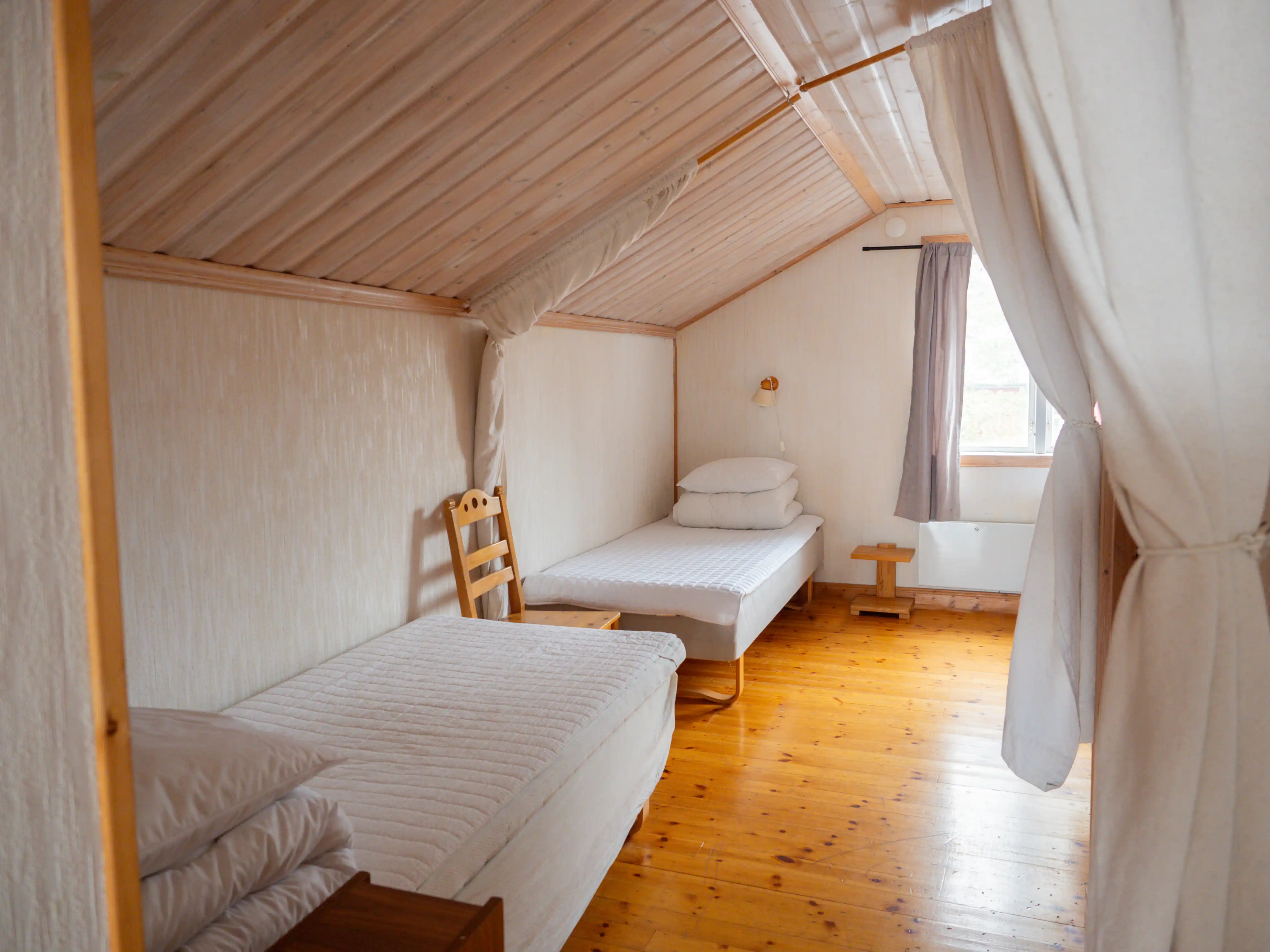 Upstairs bedroom with seven single beds