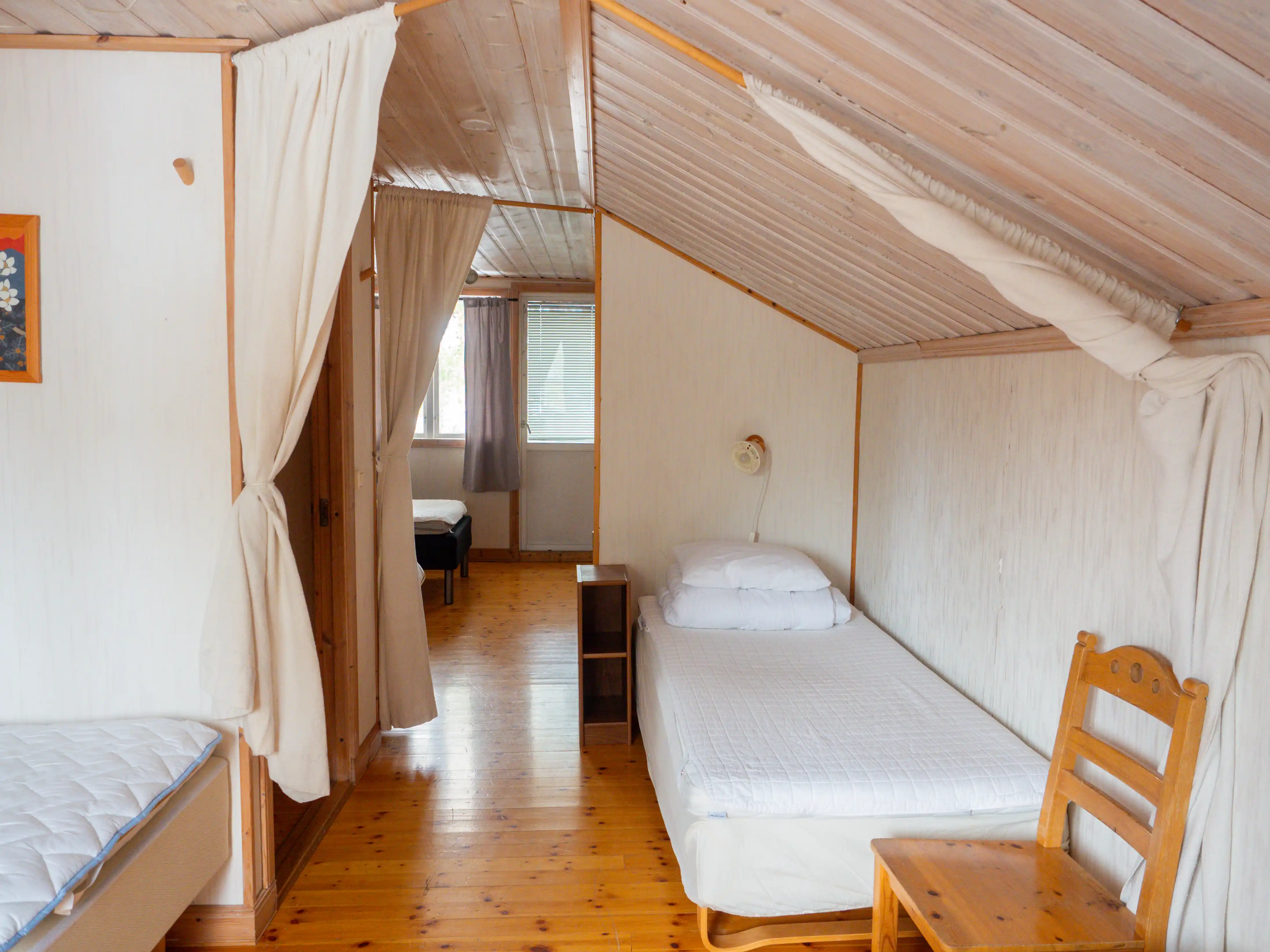 Upstairs bedroom with seven single beds