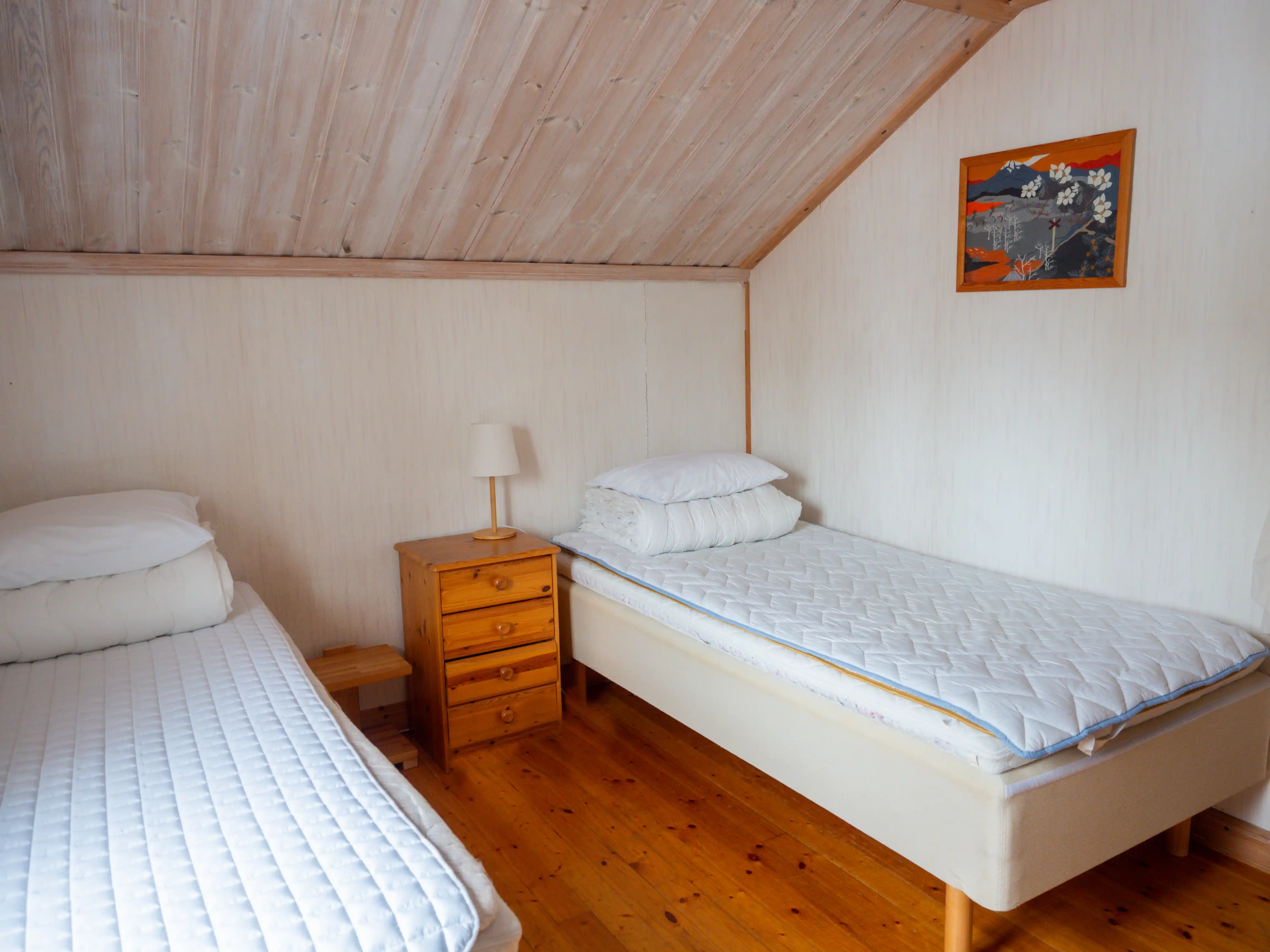 Upstairs bedroom with seven single beds