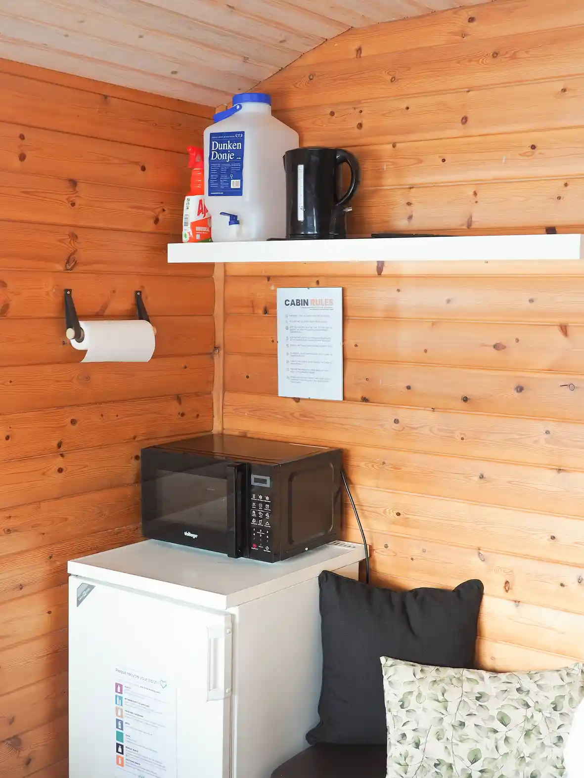 Kitchenette with a microwave, kettle and fridge