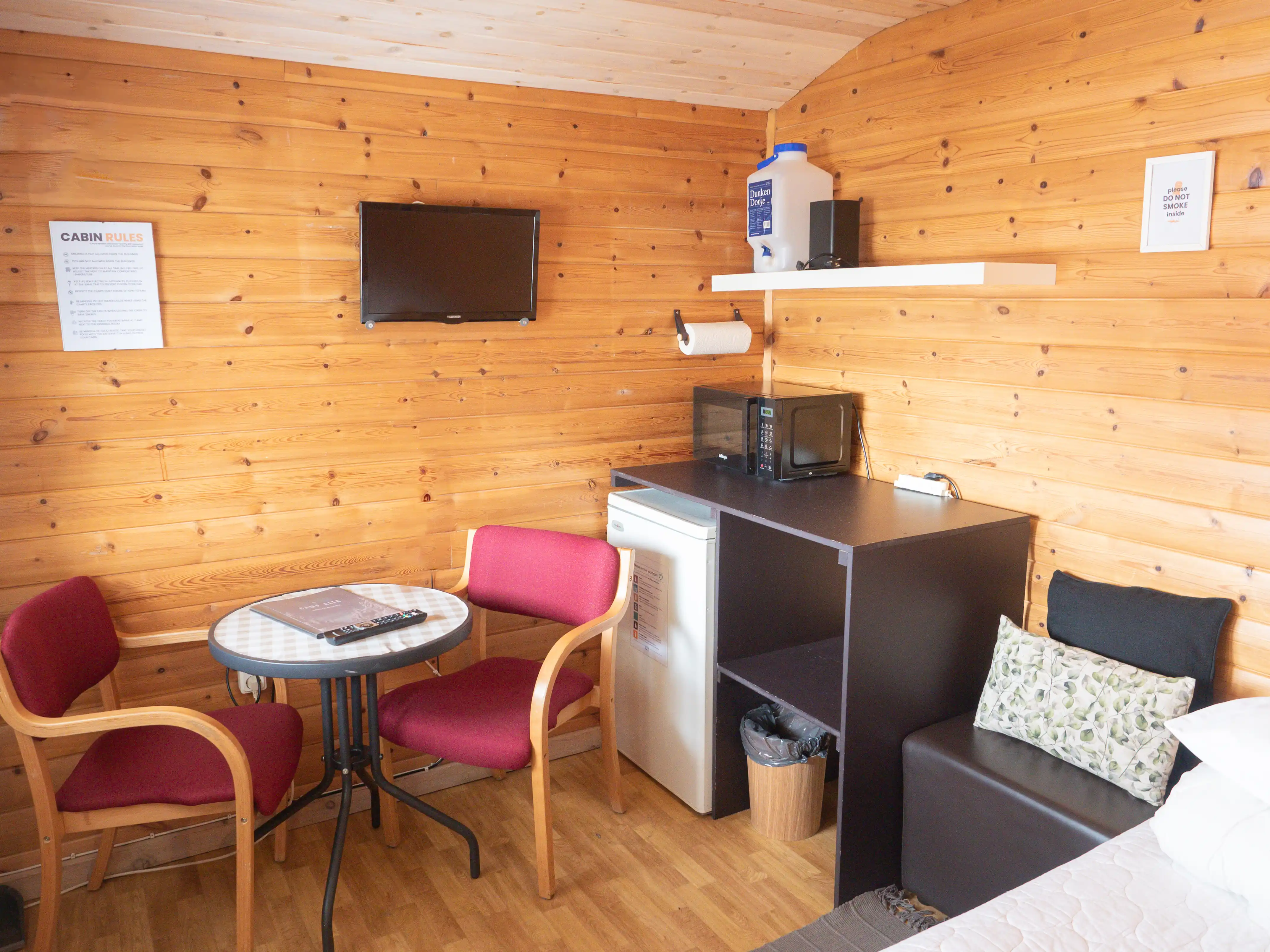 Kitchenette with a microwave, kettle and fridge