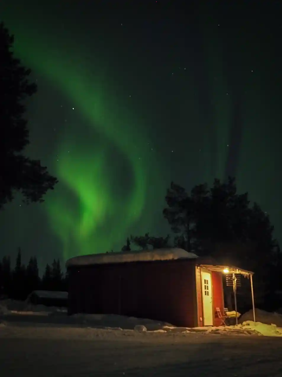 Northern lights above the cabin