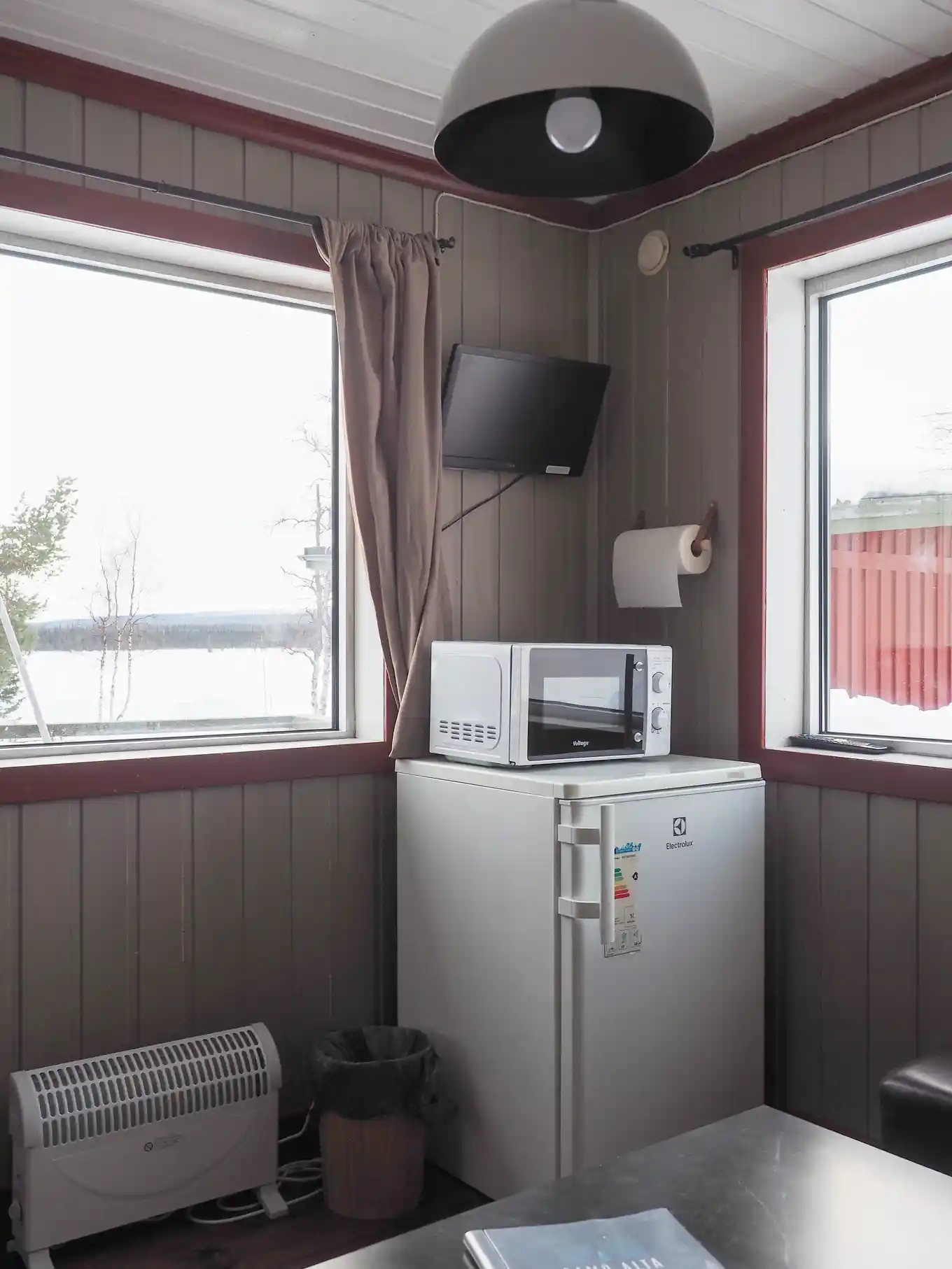 Kitchenette with a microwave, kettle and fridge