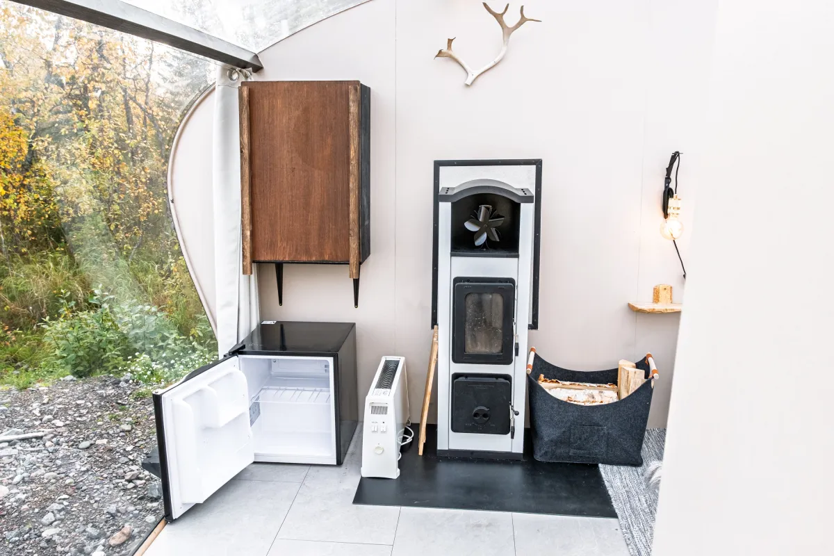 Fridge, heater and wood-burning fireplace